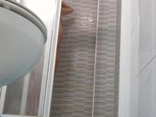 Spying on alluring Wife Shaving Pussy in Shower