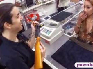 Crazy Latin fancy woman Tries To Sell Her Gun She Brought In