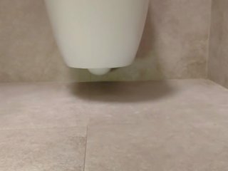 Provocative feet in the toilet